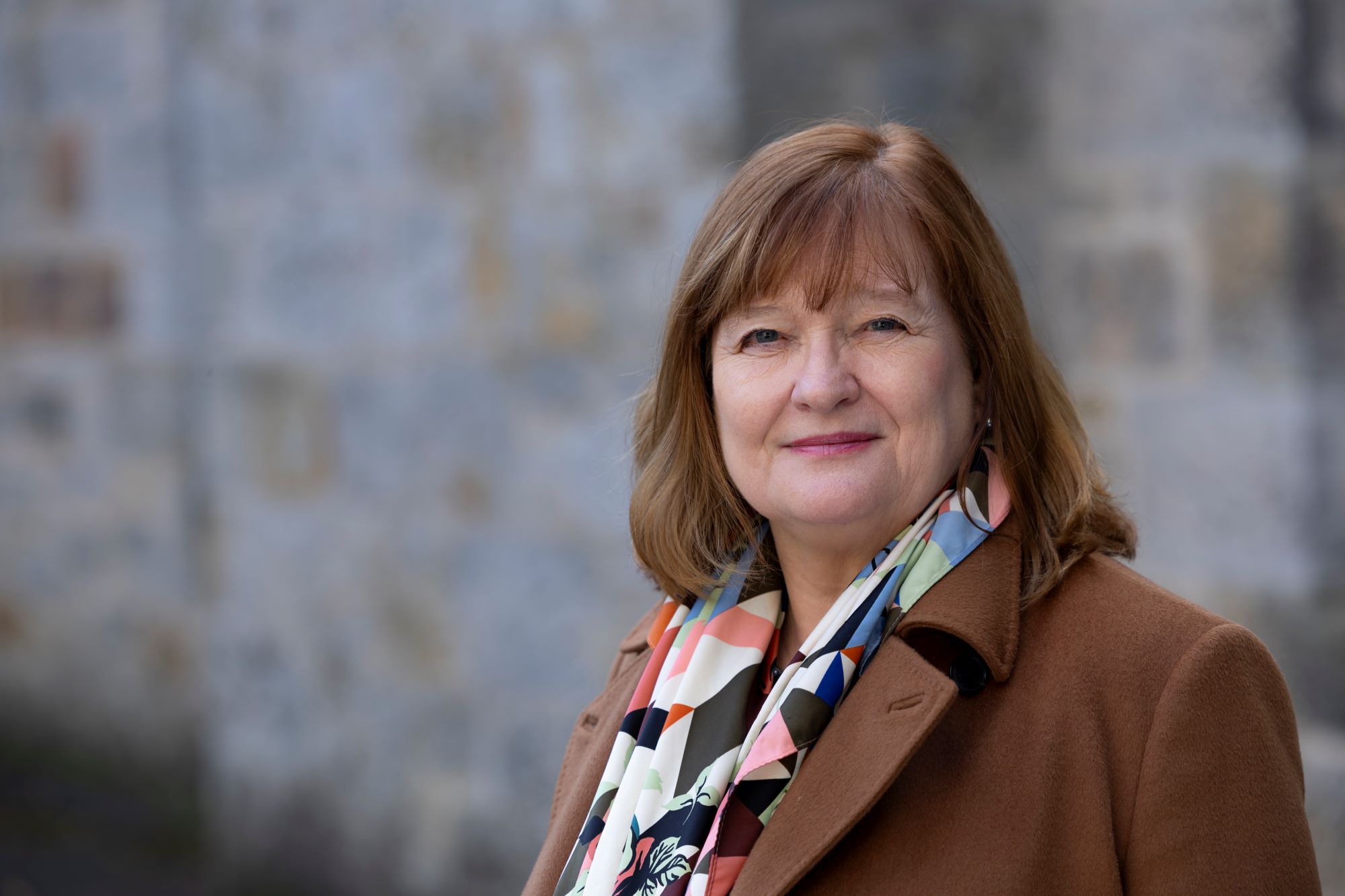 Head and shoulder image of Lynn Brown, Chief Executive of the Scottish Police Authority taken outside.